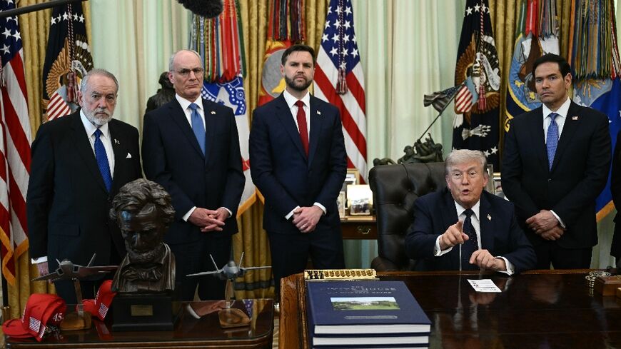 US Ambassador to Israel Mike Huckabee, Israel Ambassador to US Yechiel Leiter, US Vice President JD Vance and US Secretary of State Marco Rubio listen as US President Donald Trump speaks during a meeting with the Lebanese and Israeli ambassadors
