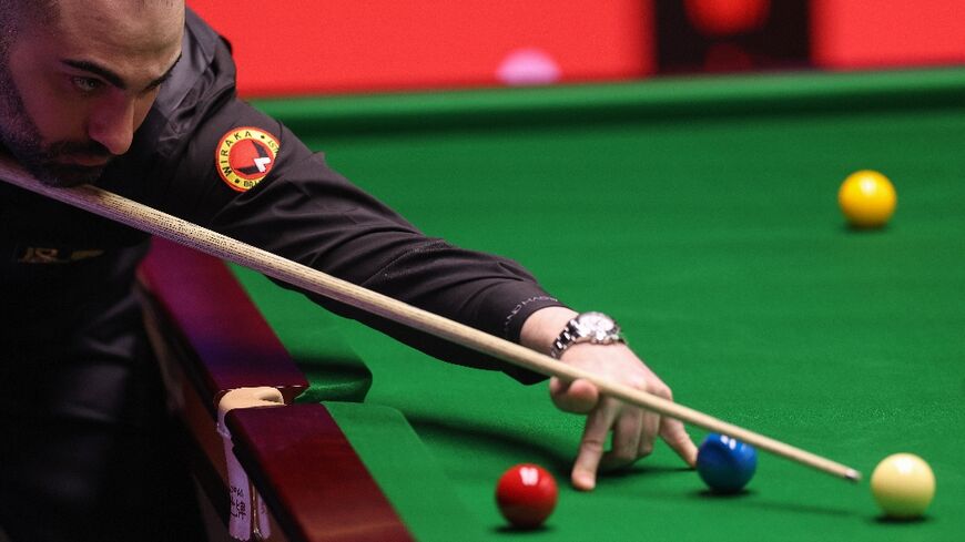 Iran's Hossein Vafaei in action at the World Snooker Championship