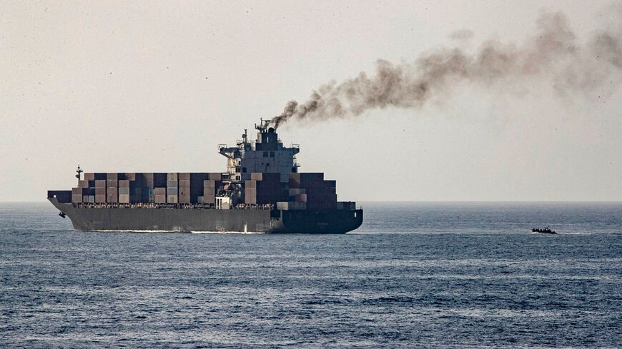 FILE PHOTO: U.S forces patrol near the Iranian-flagged cargo ship M/V Touska after it was boarded and seized by U.S. forces on Sunday, at a location given as the Arabian Sea, in this handout image released April 20, 2026.    U.S. Central Command via X/Handout via REUTERS/ File Photo