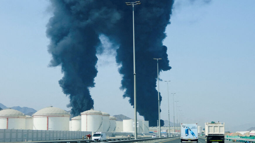 FILE PHOTO: Smoke rises in the Fujairah oil industry zone, caused by debris after interception of a drone by air defenses, according to the Fujairah media office, amid the U.S.-Israel conflict with Iran, in Fujairah, United Arab Emirates, March 14, 2026. REUTERS/Staff/File Photo