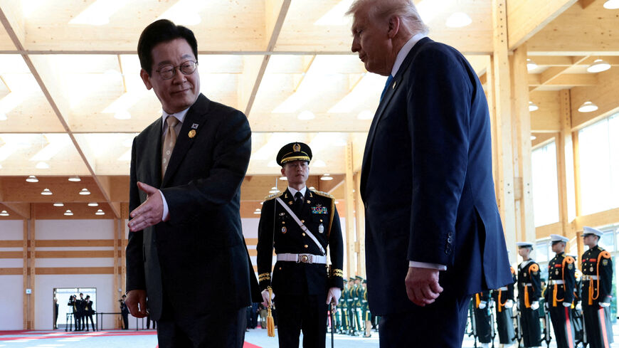 FILE PHOTO: South Korean President Lee Jae Myung gestures as he meets with U.S. President Donald Trump on the sidelines of the Asia-Pacific Economic Cooperation (APEC) leaders' summit in Gyeongju, South Korea, October 29, 2025. REUTERS/Evelyn Hockstein     TPX IMAGES OF THE DAY/File Photo
