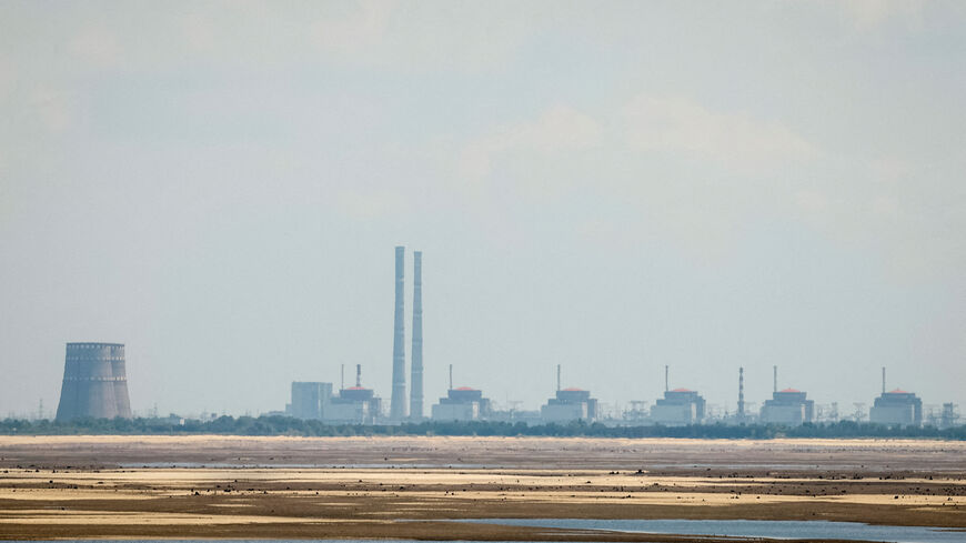 FILE PHOTO: A view shows Zaporizhzhia Nuclear Power Plant from the bank of Kakhovka Reservoir near the town of Nikopol in Dnipropetrovsk region, Ukraine June 16, 2023. REUTERS/Alina Smutko/File Photo
