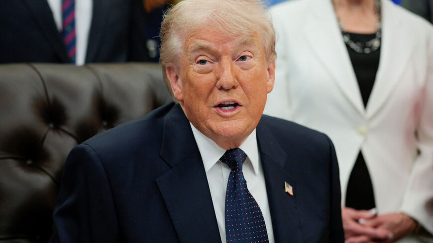 U.S. President Donald Trump speaks during an event to sign a memorandum in the Oval Office at the White House in Washington, D.C., U.S., May 5, 2026. REUTERS/Evan Vucci