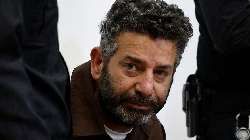 FILE PHOTO: Activist Saif Abu Keshek, a Spanish national, who was detained aboard the Gaza-bound Global Sumud Flotilla, which was intercepted by Israeli forces in international waters, appears at a court in Beersheba, southern Israel May 6, 2026. REUTERS/Amir Cohen/File Photo