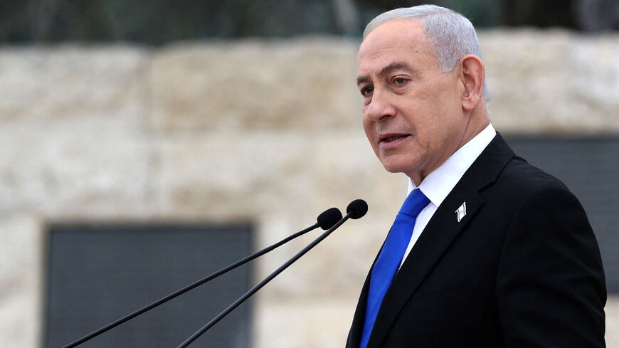 Israel’s Prime Minister Benjamin Netanyahu speaks during a ceremony commemorating Israel’s Remembrance Day for fallen soldiers, or Yom HaZikaron, at the Military Cemetery on Mount Herzl in Jerusalem April 21, 2026.     ILIA YEFIMOVICH/Pool via REUTERS