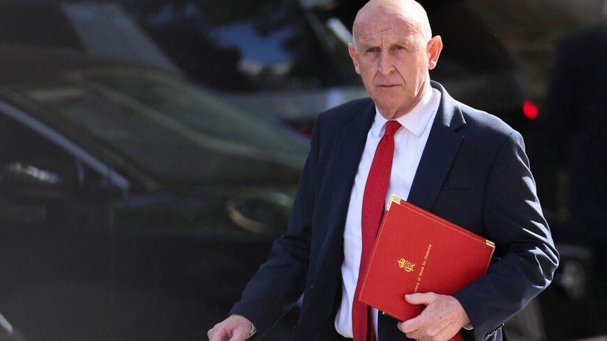 British Defence Secretary John Healey walks on Downing Street, to attend a cabinet meeting, the day before the State Opening of Parliament, in London, Britain, May 12, 2026. REUTERS/Toby Melville
