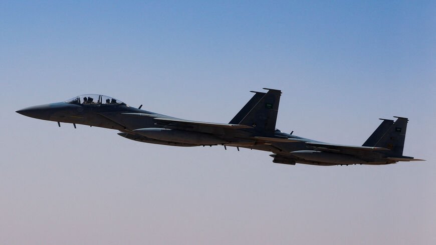 FILE PHOTO: A Saudi fighter jet accompanies Air Force One, carrying U.S. President Donald Trump, on approach to the King Khalid International Airport in Riyadh, Saudi Arabia, May 13, 2025. REUTERS/Brian Snyder/File Photo