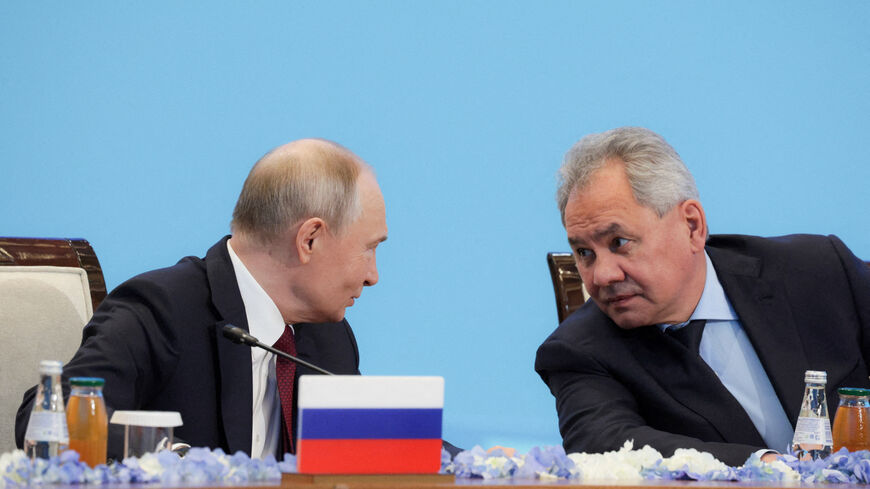 FILE PHOTO: Russia's President Vladimir Putin speaks with Security Council Secretary Sergei Shoigu at the Collective Security Treaty Organisation (CSTO) summit in Astana, Kazakhstan, November 28, 2024. Sputnik/Gavriil Grigorov/Kremlin via REUTERS/File Photo