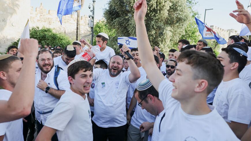 People take part in the annual Jerusalem Day march in the Old City of Jerusalem, May 14, 2026. REUTERS/Ammar Awad
