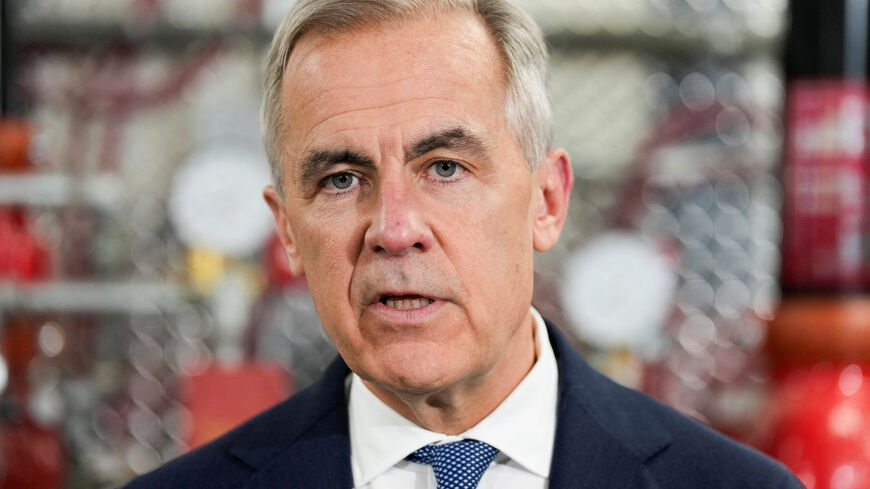 Canada's Prime Minister Mark Carney speaks as he meets unionized skilled trades workers at the United Association of Journeymen and Apprentices of the Plumbing and Pipefitting Industry of the United States and Canada (UA) office in Calgary, Alberta, Canada, May 15, 2026.  REUTERS/Todd Korol