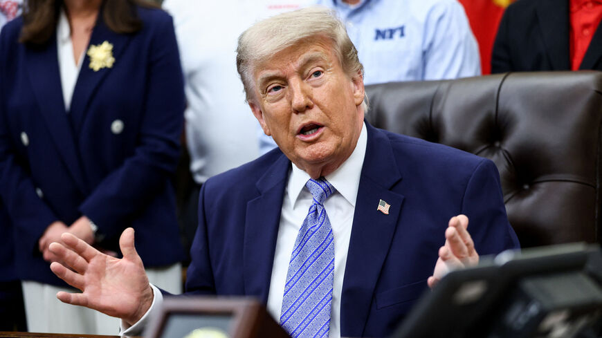 U.S. President Donald Trump speaks during an announcement with U.S. Environmental Protection Agency (EPA) Administrator Lee Zeldin (not pictured) in the Oval Office at the White House, in Washington, D.C., U.S., May 21, 2026. REUTERS/Kevin Lamarque