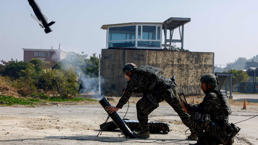 FILE PHOTO: Soldiers operate a Taiwan-made attack drone during an annual military exercise ahead of the Lunar New Year, in Kaohsiung, Taiwan, January 29, 2026. REUTERS/Ann Wang/File Photo