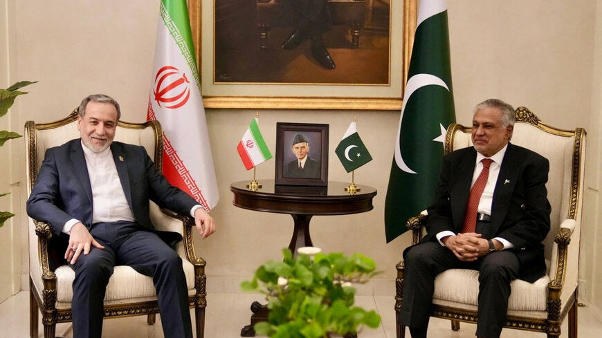 Iran's Foreign Minister Abbas Araqchi meets with Pakistan's Foreign Minister Ishaq Dar, as Pakistan prepares to host the U.S. and Iran for the second phase of peace talks, in a location given as Islamabad, Pakistan, released April 25, 2026. ESMAEIL BAQAEI VIA X/Handout via REUTERS