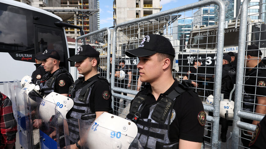 Riot police stand guard outside the headquarters of the main opposition Republican People's Party (CHP), after authorities ordered enforcement of a court ruling ousting the party's leadership from the building, in Ankara, Turkey, May 24, 2026. REUTERS/Efekan Akyuz