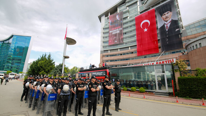 Riot police stand guard outside the headquarters of the main opposition Republican People's Party (CHP), after authorities ordered enforcement of a court ruling ousting the party's leadership from the building, in Ankara, Turkey, May 24, 2026. REUTERS/Efekan Akyuz