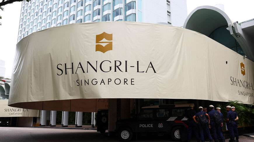 Police stand guard outside the venue of IISS Shangri-La Dialogue security summit in Singapore, May 30, 2025. REUTERS/Edgar Su