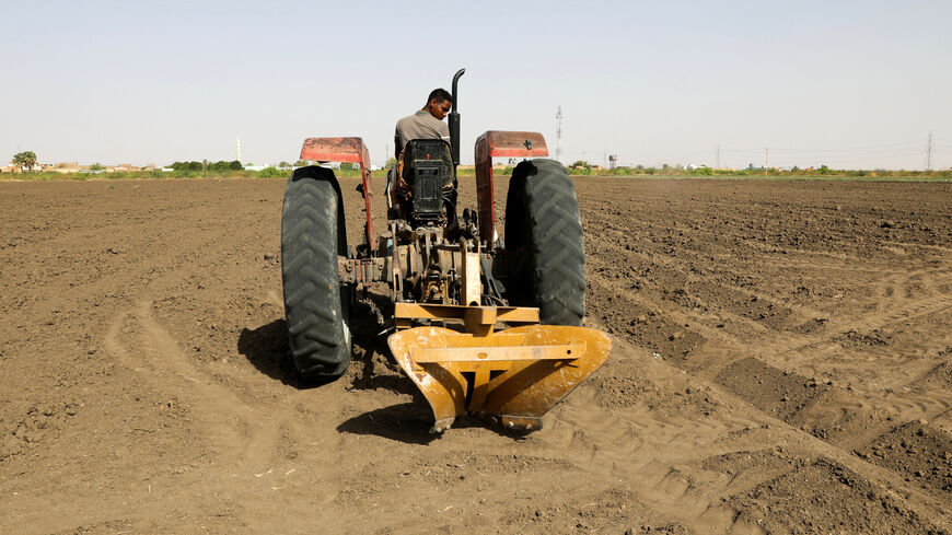 A tractor is used to plow the land at an agricultural project in South Omdurman, Sudan May, 21, 2026. REUTERS/El Tayeb Siddig