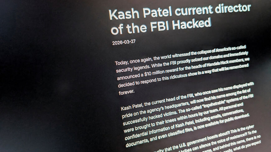 FILE PHOTO: The website used by the Handala Hack Team, an Iran-linked hacker group which has claimed credit for the breach of FBI Director Kash Patel?s personal email, is shown on a screen in Washington D.C., U.S., March 27, 2026. REUTERS/Raphael Satter/File Photo