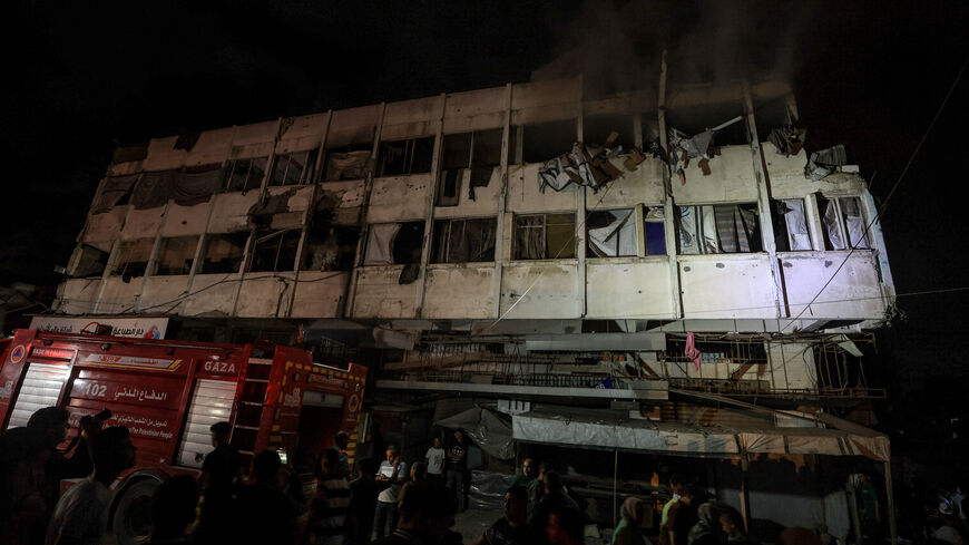 Palestinians gather at the site of an Israeli strike on a residential building in Gaza City, May 27, 2026. REUTERS/Dawoud Abu Alkas