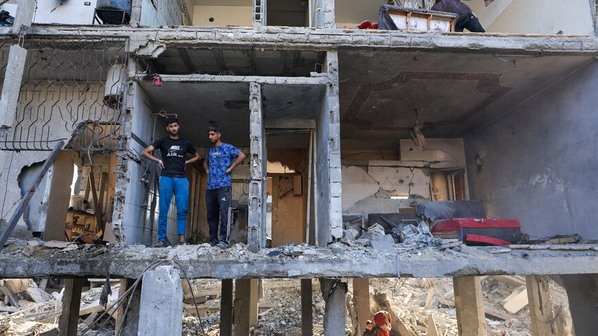 Palestinians inspect the site of an Israeli strike on a house, which was pre-warned by the Israeli military to evacuate before the strike was carried out late on Thursday, at Shati (Beach) refugee camp in Gaza City, May 29, 2026. REUTERS/Dawoud Abu Alkas