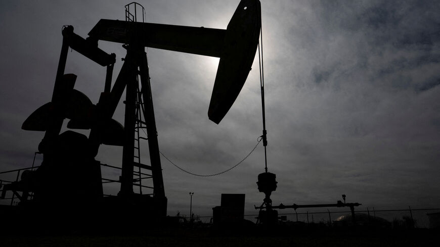 FILE PHOTO: A pump jack operates near a crude oil reserve in the Permian Basin oil field near Midland, Texas, U.S. February 18, 2025.  REUTERS/Eli Hartman/File Photo