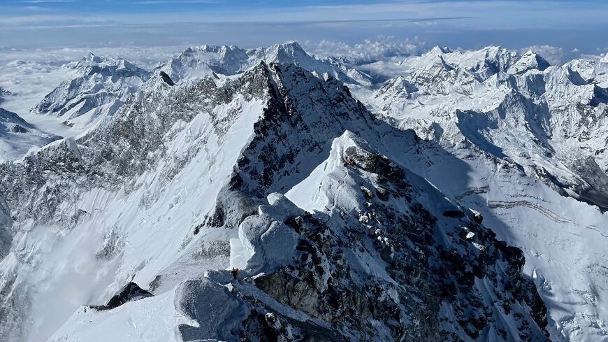 Climber Mostafa Salameh is carrying a kite with handwritten messages of Gazan children to the summit of Mount Everest