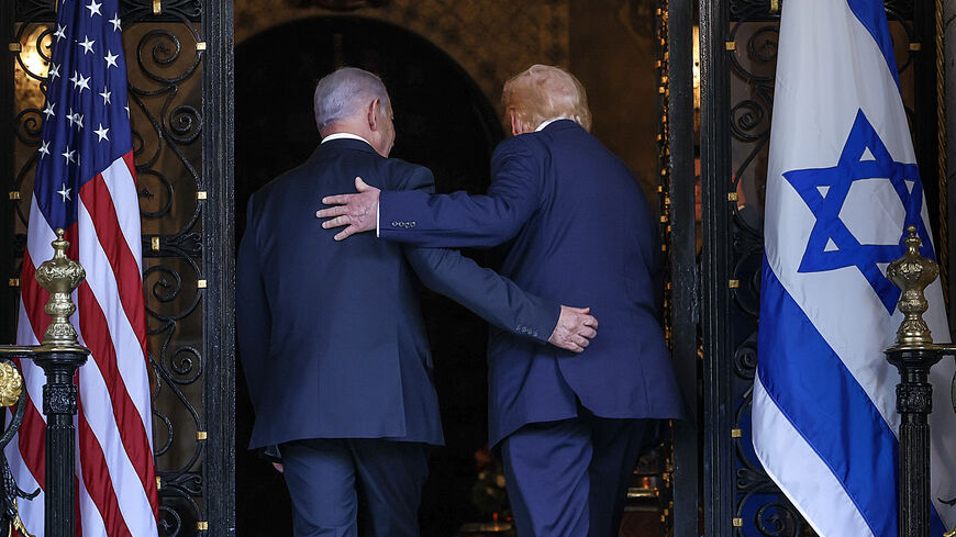 PALM BEACH, FLORIDA - DECEMBER 29: (EDITOR'S NOTE: Alternate crop) U.S. President Donald Trump welcomes Israeli Prime Minister Benjamin Netanyahu to his Mar-a-Lago club on December 29, 2025 in Palm Beach, Florida. The two leaders are scheduled to hold a bilateral meeting to discuss regional security in the Middle East as well as the U.S.-Israel partnership. (Photo by Joe Raedle/Getty Images)