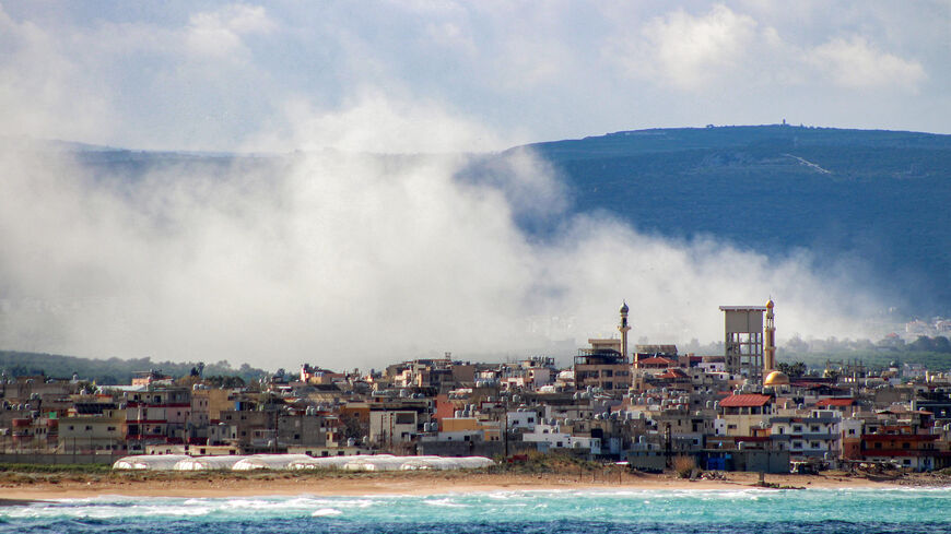 Smoke rises following Israeli bombardment on the village of Qlaile as pictured from nearby Tyre in southern Lebanon on April 7, 2026. The Israeli military said on April 7 that it had completed the deployment of ground troops along a "defence line" in southern Lebanon, where it is fighting Iran-backed Hezbollah. The military has not given any geographical details on the furthest point to which its soldiers have advanced into Lebanese territory. (Photo by Kawnat Haju/AFP via Getty Images)