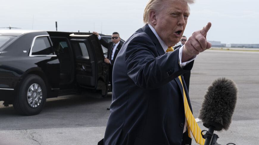 PALM BEACH, FLORIDA - MAY 2: U.S. President Donald Trump speaks to journalists before boarding Air Force One at Palm Beach International Airport on May 2, 2026 in Palm Beach, Florida. Trump is spending the weekend at his Mar-A-Lago resort. (Photo by Roberto Schmidt/Getty Images)