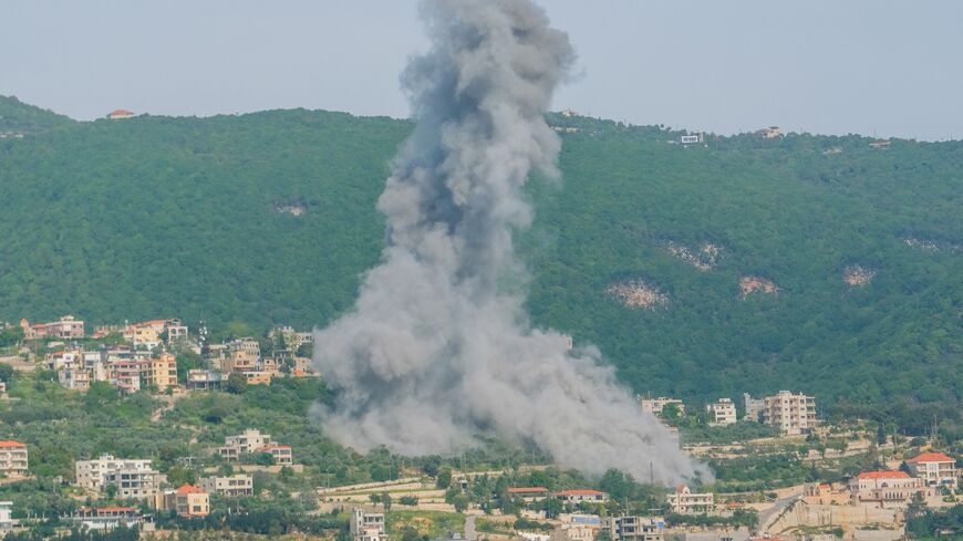 Smoke rises following an Israeli airstrike in Jarjoua, southern Lebanon, on May 13, 2026.