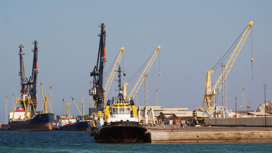 TO GO WITH STORY by Peter Martell: "Eritrea-economy-port": A couple of boats and two tug boats can be seen in Eritrea's Red Sea port of Massawa on November 18, 2007. Once one of East Africa's busiest ports, the town is still recovering after being badly bombed in 1990 during Eritrea's war of liberation from Ethiopia. The government is trying to revitalize the port, but efforts are hampered by a sluggish economy and threat of a renewed conflict with Ethiopia. AFP PHOTO/Peter MARTELL (Photo credit should read