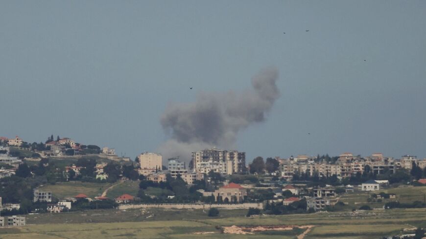 Smoke rises after an Israeli airstrike on the southern Lebanese village of Jibshit on May 17