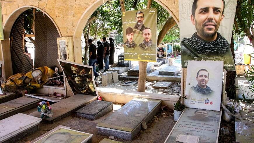 In the cemetery in south Lebanon's Deir Qanun al-Nahr, gravediggers prepare tombs for the village's "martyrs" in the latest Israel-Hezbollah war, near those killed in the previous conflicts between the foes