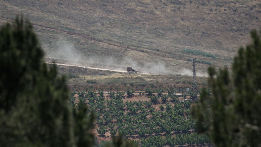 An Israeli military vehicle on a road in southern Lebanon, near the Israel-Lebanon border, as seen from northern Israel, June 2, 2026. REUTERS/Shir Torem     TPX IMAGES OF THE DAY