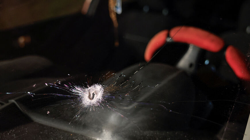 A bullet hole in the front window of a car of Palestinian father Fahed Abu Haykal after his seven-month-old baby was killed by Israeli forces, in Hebron in the Israeli-occupied West Bank, June 5, 2026. REUTERS/Mussa Qawasma