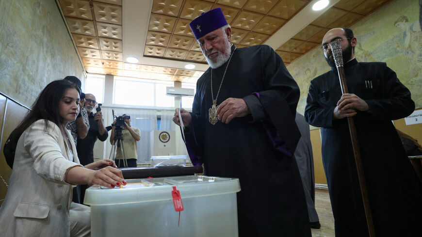 Catholicos Karekin II, head of the Armenian Apostolic Church, waits before casting a ballot at a polling station during a parliamentary election in Vagharshapat (Etchmiadzin community), Armenia, June 7, 2026. Vahram Baghdasaryan/Photolure via REUTERS