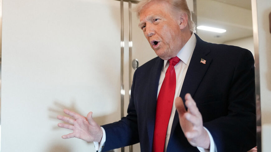 U.S. President Donald Trump speaks to members of the media on board Air Force One while flying from Joint Base Andrews to Chippewa Valley Regional Airport in Eau Claire, Wisconsin, U.S., June, 5, 2026. REUTERS/Nathan Howard