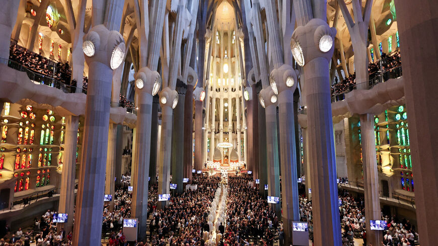 Pope Leo XIV walks to celebrate Holy Mass at the Basilica of the Sagrada Familia, during his apostolic journey, in Barcelona, Spain, June 10, 2026. REUTERS/Yara Nardi
