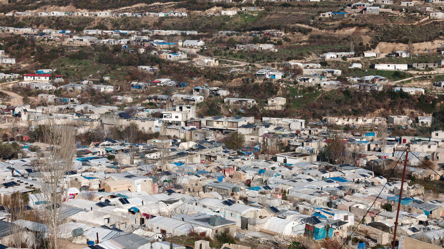 FILE PHOTO: A drone view shows refugee tents in the country side of Idlib, Syria, January 3, 2026. REUTERS/Mahmoud Hassano/File Photo