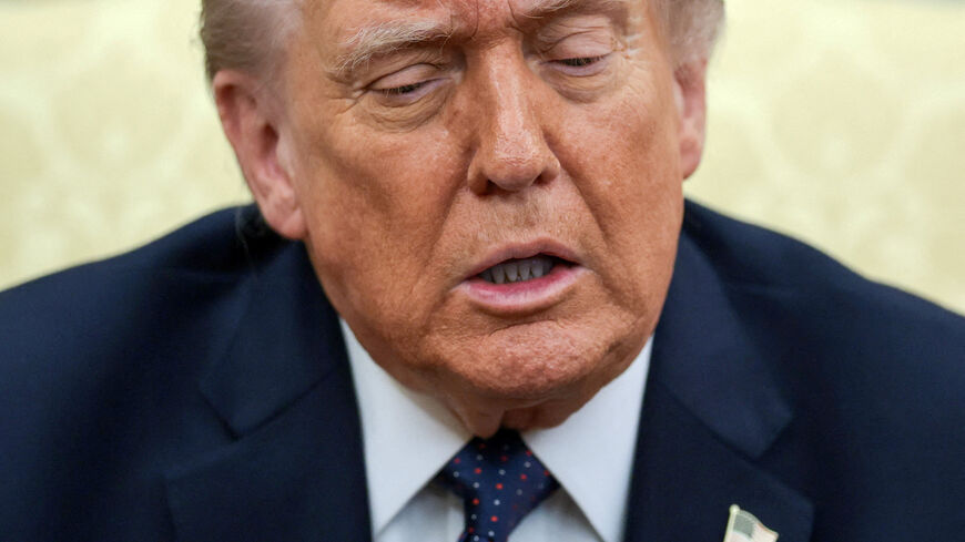 FILE PHOTO: U.S. President Donald Trump speaks as he meets with German Chancellor Friedrich Merz (not pictured) in the Oval Office at the White House in Washington, D.C., U.S., March 3, 2026. REUTERS/Jonathan Ernst/File Photo
