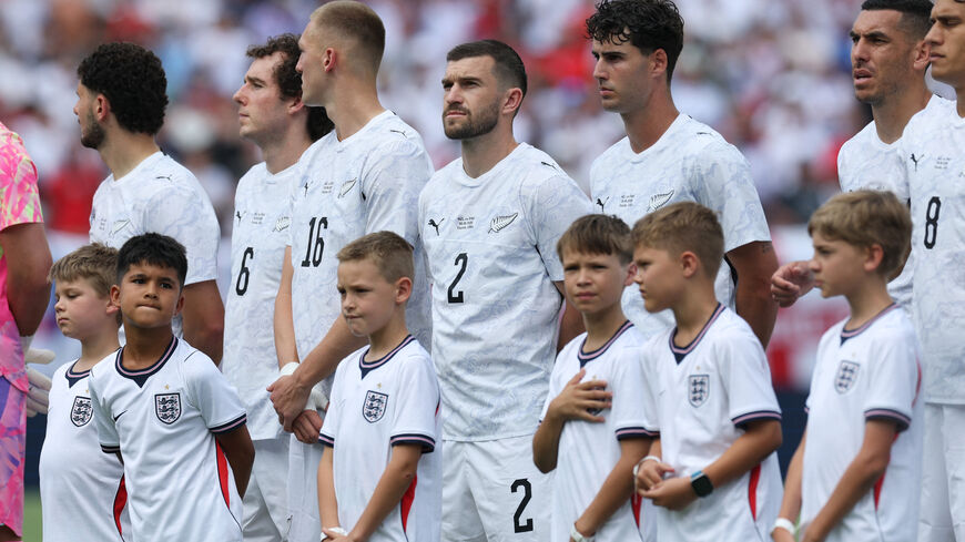 Soccer Football - International Friendly - England v New Zealand - Raymond James Stadium, Tampa, Florida, U.S. - June 6, 2026 New Zealand's Tim Payne and teammates line up during the national anthems before the match IMAGN IMAGES via Reuters/Nathan Ray Seebeck