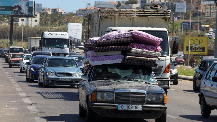 Displaced people make their way back to their homes in southern Lebanon following a deal between the U.S. and Iran, in Sidon, Lebanon, June 15, 2026. REUTERS/Aziz Taher