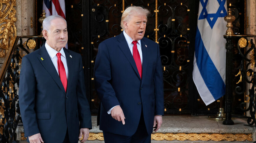 U.S. President Donald Trump speaks next to Israeli Prime Minister Benjamin Netanyahu upon arrival for meetings at Trump's Mar-a-Lago club in Palm Beach, Florida, U.S., December 29, 2025. REUTERS/Jonathan Ernst
