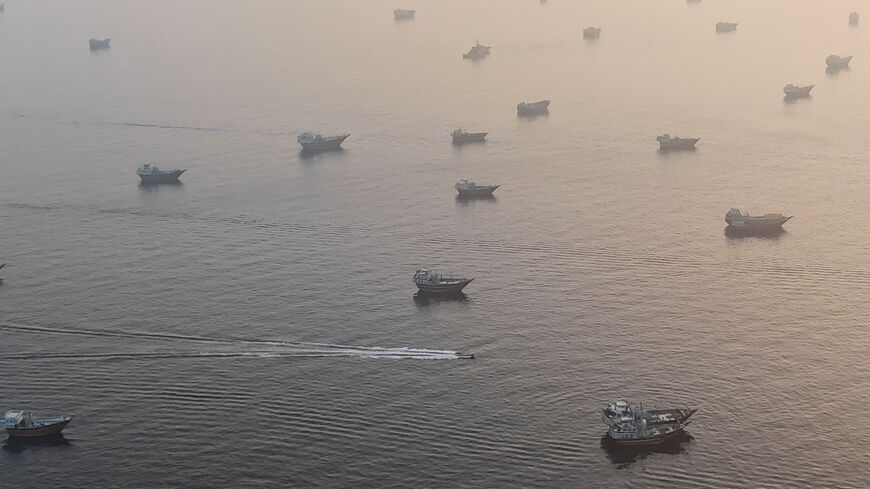 A drone view shows vessels in the Strait of Hormuz, as seen from Musandam, Oman, June 15, 2026. REUTERS/Stringer