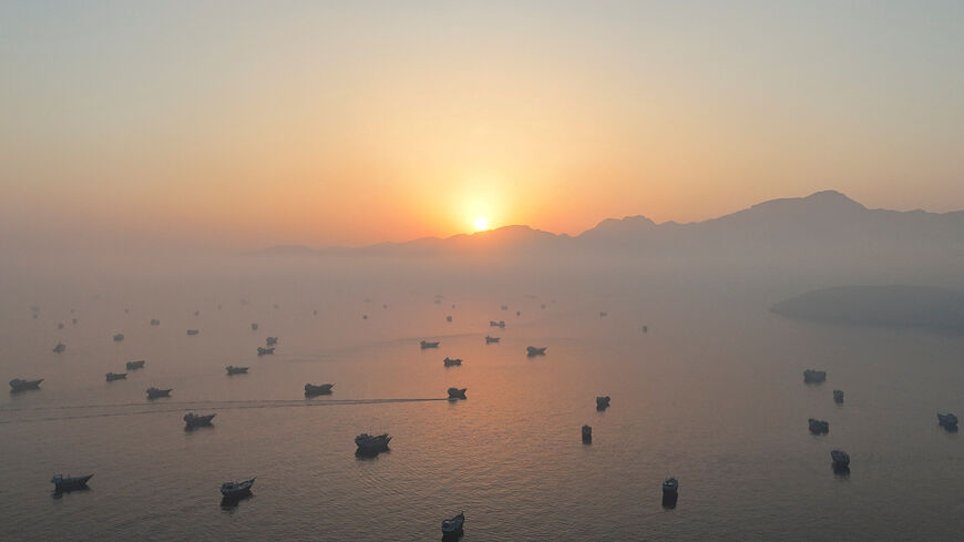 FILE PHOTO: A drone view shows vessels in the Strait of Hormuz, as seen from Musandam, Oman, June 15, 2026. REUTERS/Stringer/File Photo