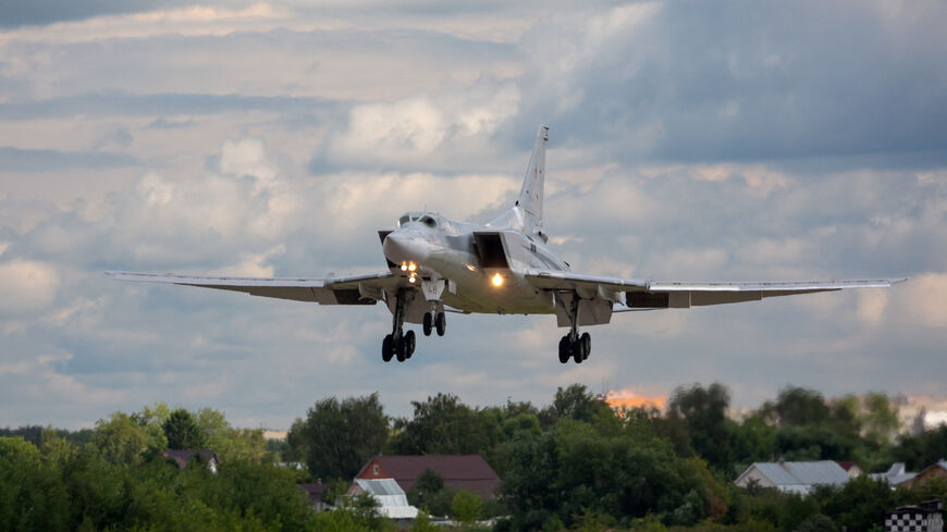 FILE PHOTO: A Russian Tu-22M3 strategic bomber plane flies before landing at Dyagilevo military air base in the Ryazan region, Russia, August 8, 2018. REUTERS/Marina Lystseva/File Photo