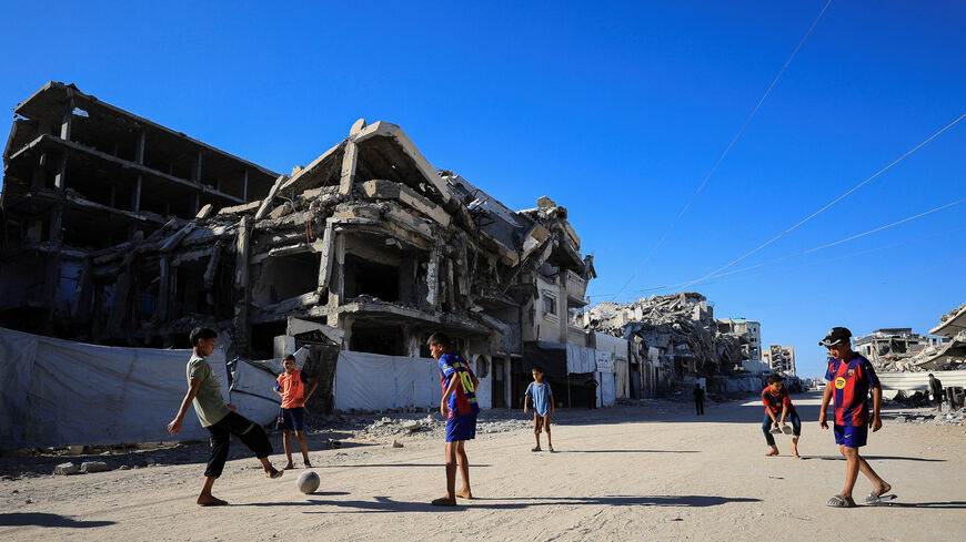 Palestinian children play soccer on a street in Gaza City, June 13, 2026. REUTERS/Dawoud Abu Alkas