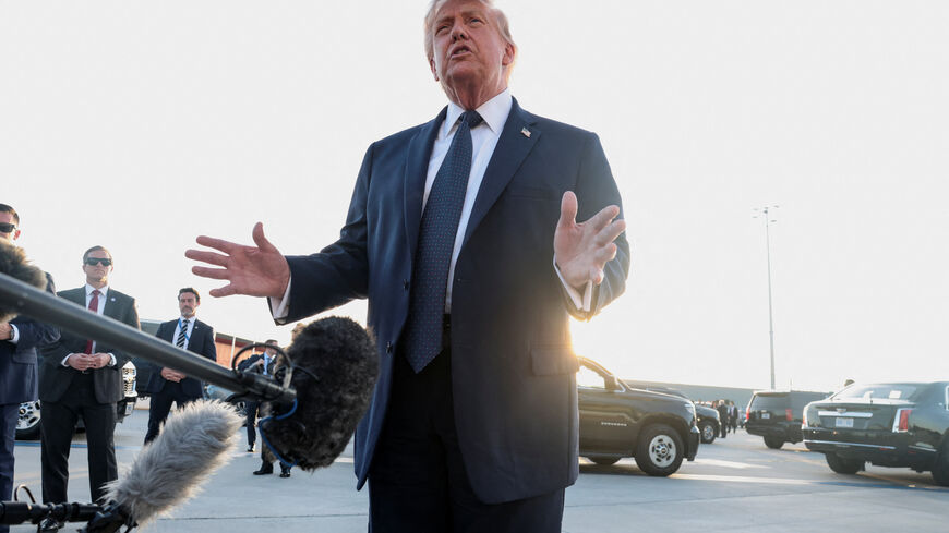 U.S. President Donald Trump speaks to the media upon arrival at Paris Orly airport, following the G7 Summit, in Orly, France, June 17, 2026. REUTERS/Evelyn Hockstein