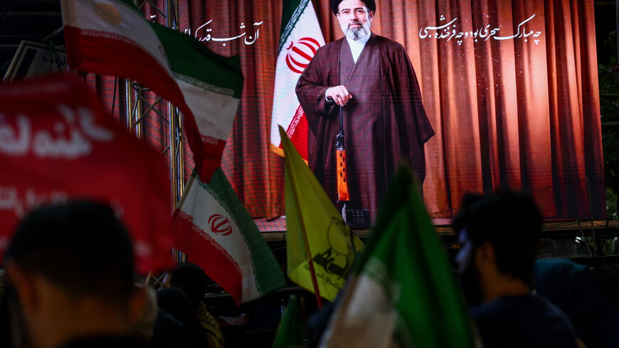 A screen displays an image of Iran's Supreme Leader Mojtaba Khamenei during a rally in Tehran, Iran, May 29, 2026. Majid Asgaripour/WANA (West Asia News Agency) via REUTERS