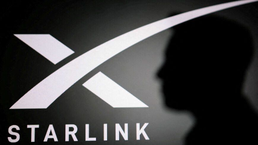FILE PHOTO: The silhouette of Elon Musk and Starlink logo are seen in this illustration taken June 11, 2026. REUTERS/Dado Ruvic/Illustration/File Photo